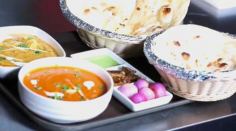 Butter chicken, dhal and naan.