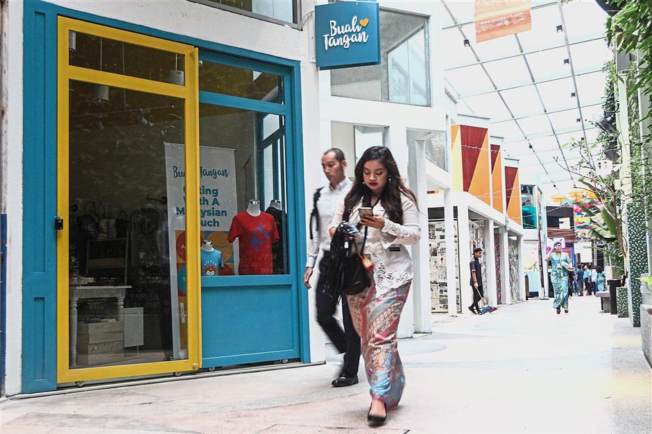 Shops at KLCW include non-F&B outlets such as souvenir shops.