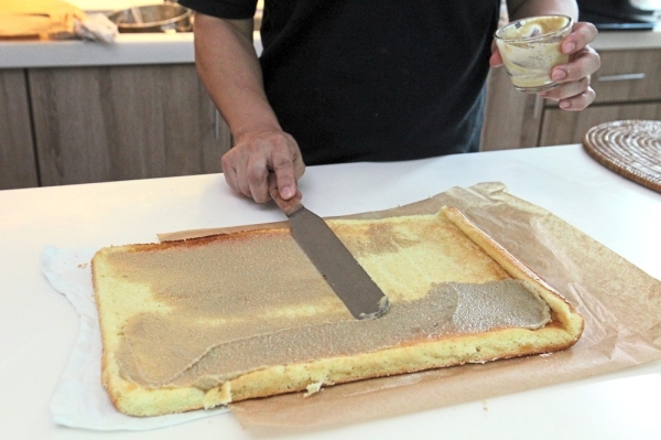 Unroll the cake and spread kaya all over it.