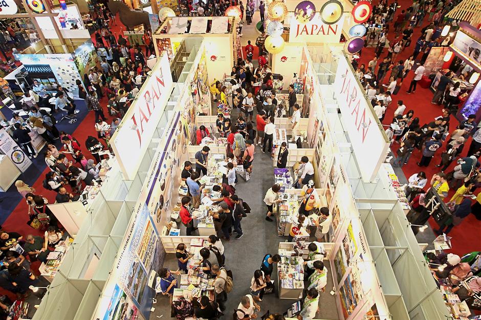 Visitors checking out the many promotions at MATTA Fair.