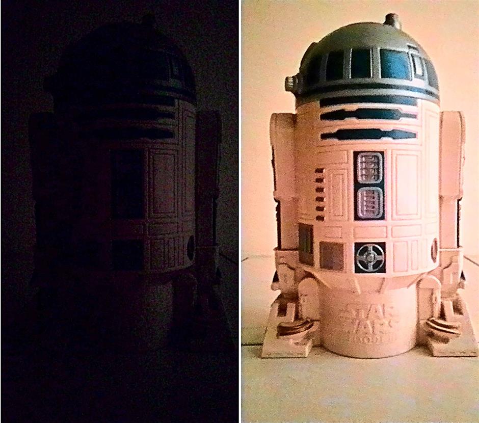 Brighter outlook: The photo on the left shows the image of a Star Wars R2D2 storage jar which is barely visible and was captured without the Low Light Mode turned on, whereas the one on the right represents a picture shot in the same environment but with Low Light Mode.