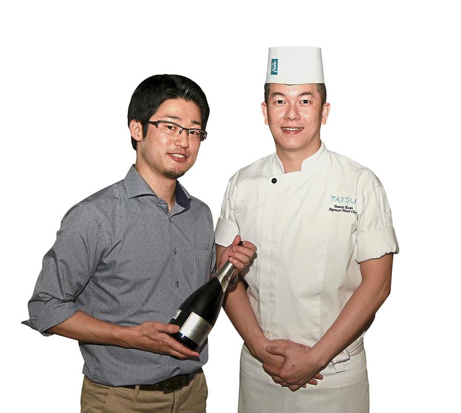 Kuan (right) with Tojo at the sake-pairing dinner at Tatsu.