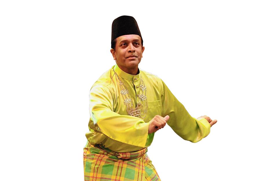 Cultural understanding: Dr Gonzales performing a traditional Malay dance in 2011. He believes that embracing another culture is vital in today’s Malaysia.