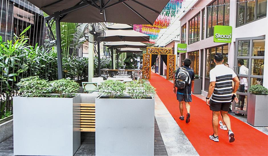 The Boardwalk comprises cafes with terraced seating and art installations scattered throughout the stretch.