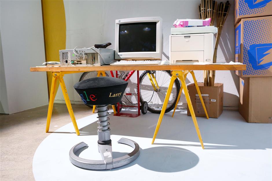 Google co-founder Larry Page's original stool and desk are displayed at Google Search's 20th Anniversary Event on September 23, 2018 in San Francisco, California. (Photo by Amy Osborne / AFP)