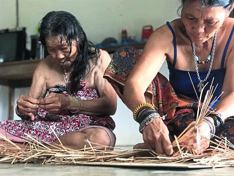 Tanoti introduced a community outreach project that empowers women by teaching them the art of songket weaving. By learning the skill, they can become artisans at Tanoti. Among the communities involved in the project are Penan women from 20 villages in Sarawak. - Photo: Tanoti