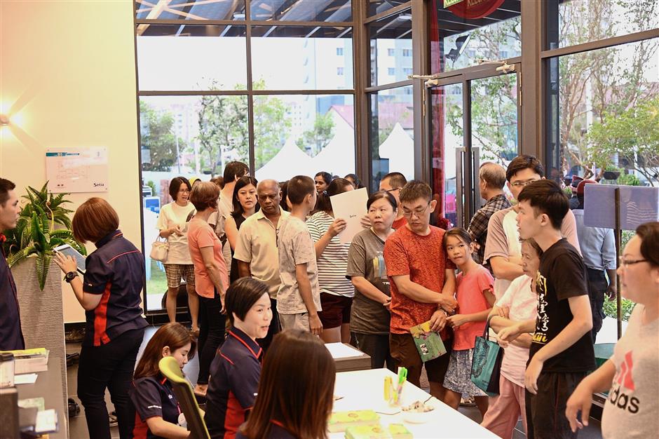 Guests enjoying themselves as they explore the newly opened Setia Sky Vista Sales Suite.