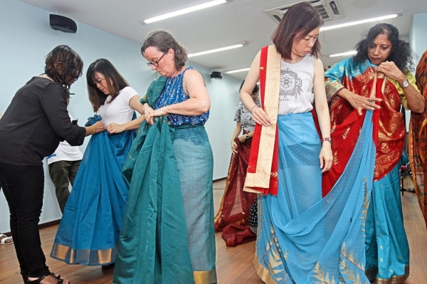 Tying saree clearance