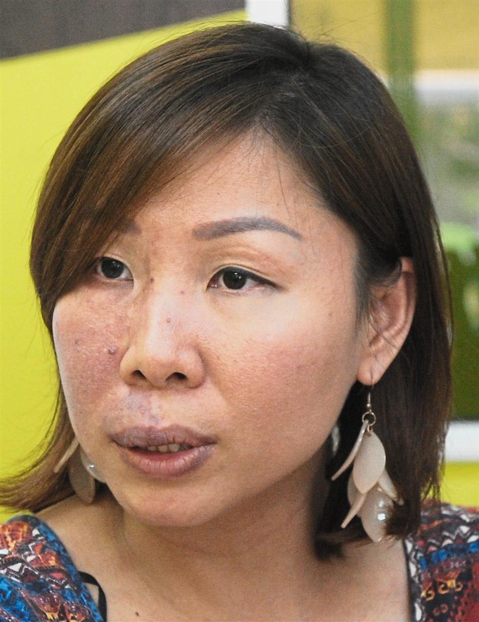 Aiko Tan, manager of a printing shop, speaking to The Star reporter when met at her shop.Star pic by ASRI ABDUL GHANI / The Star / April 12, 2018