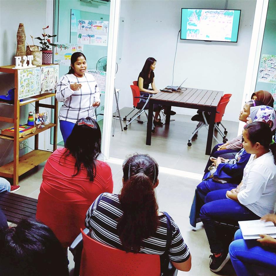 Vital knowledge: A Suka Society staff member training teachers from the Orang Asli community.