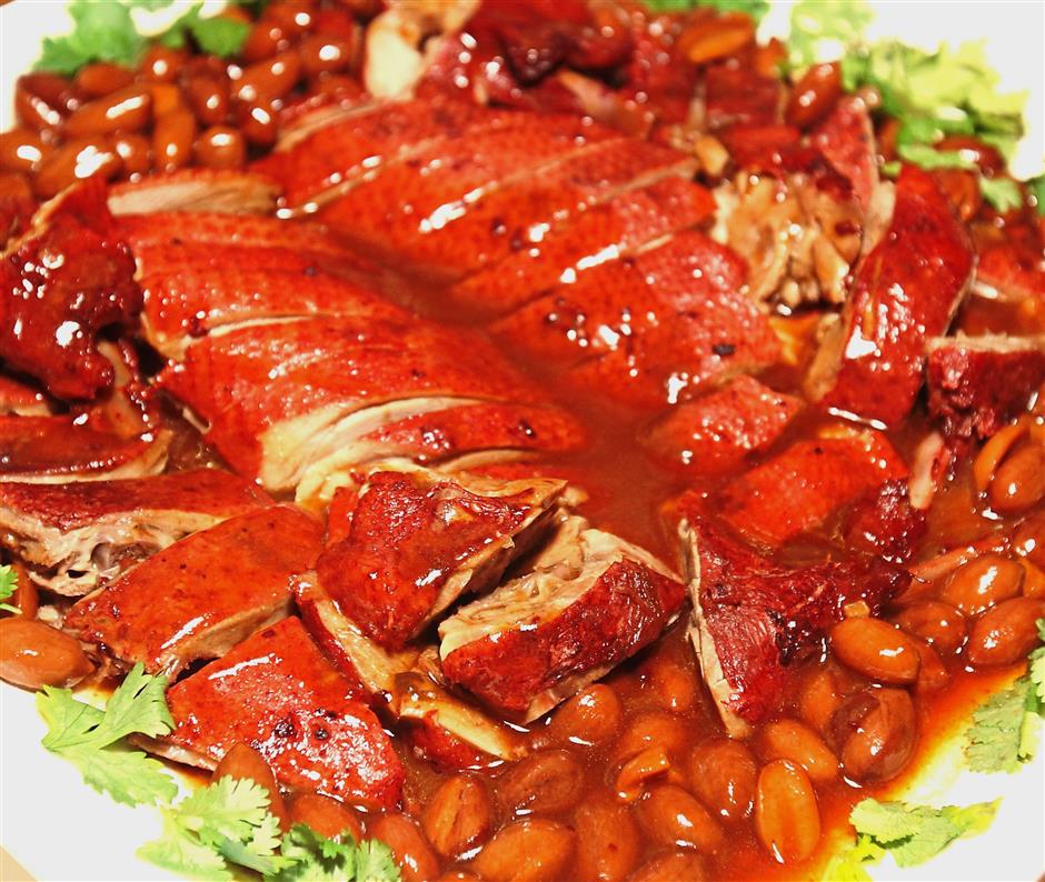 Braised Duck with Red Yeast Rice and Peanut